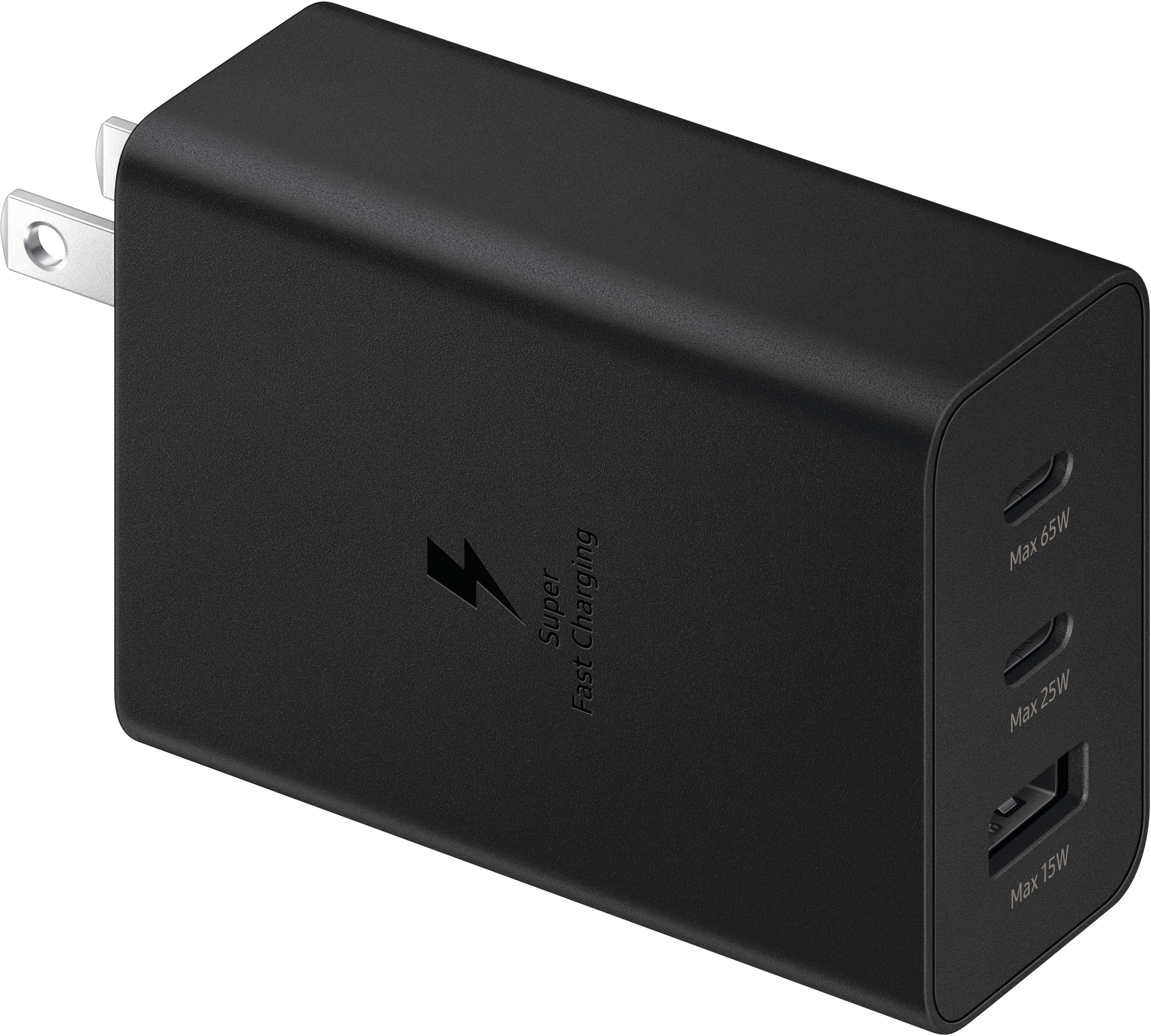 Installing Samsung 65W Trio Adapter Fast Charging Three Devices on a wooden desk
